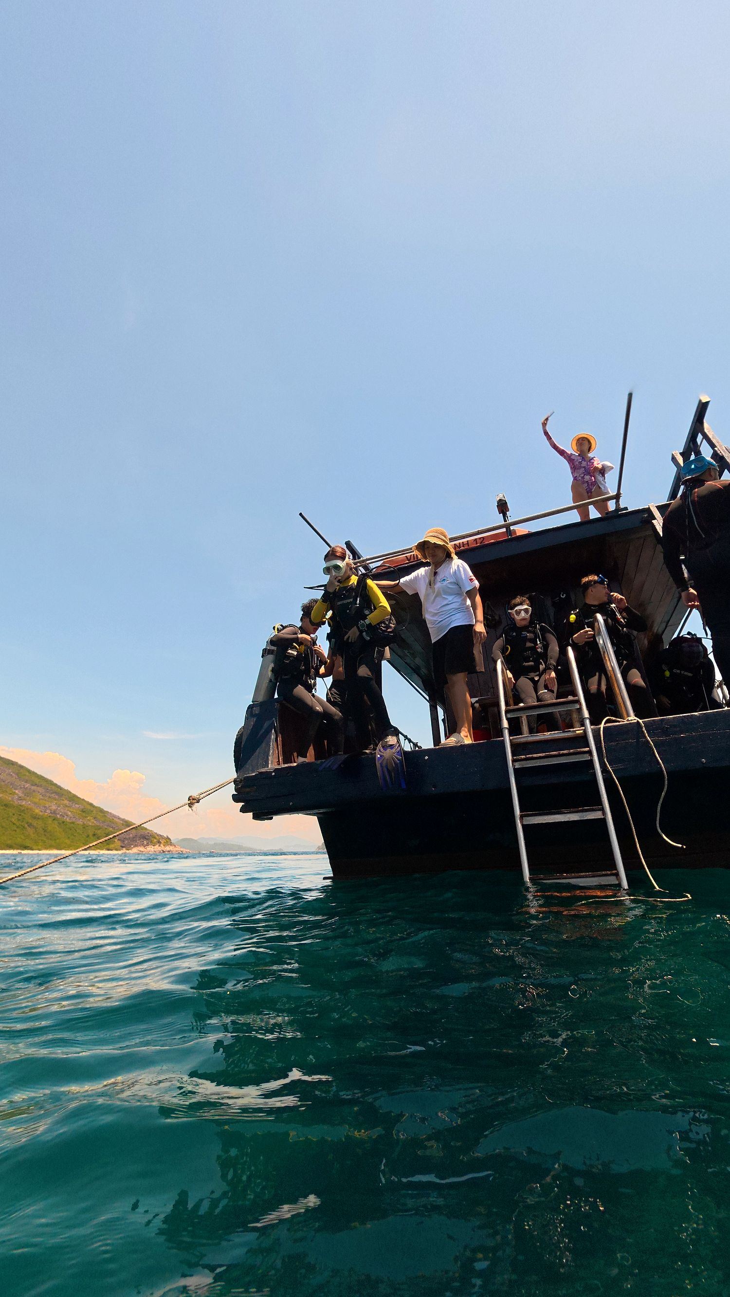 Divers kitted up and ready on the Vietnam Underneath dive boat